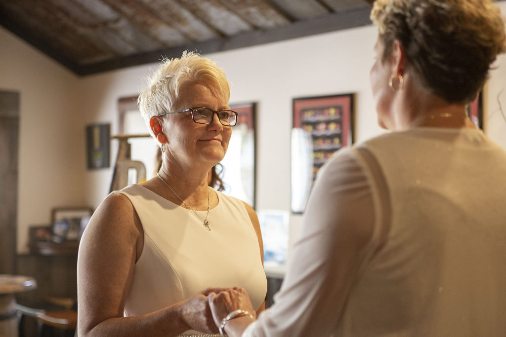 Pinckney bride smiling at her wife