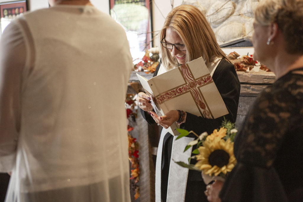 Officiant preparing the rings to be exchanged