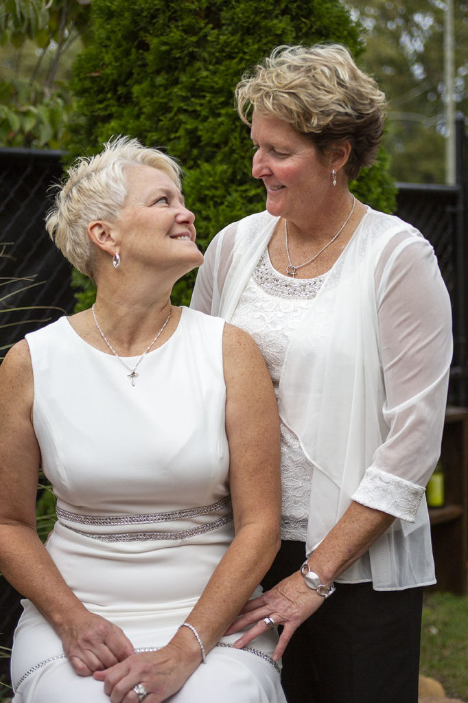 Brides looking at each other