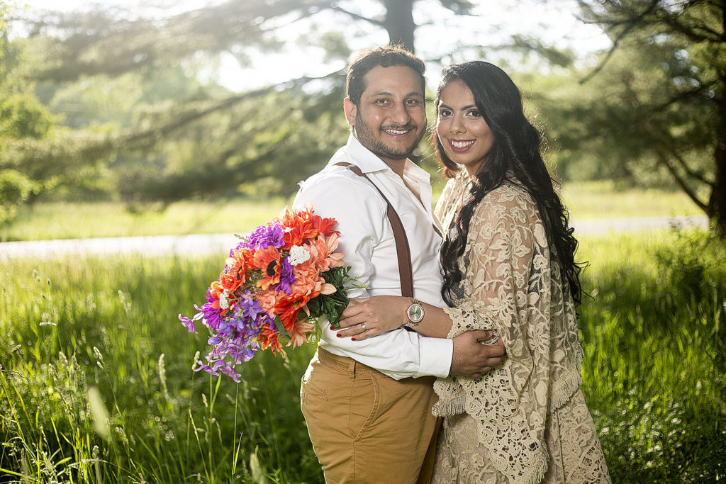 Ann Arbor boho wedding couple hold each other