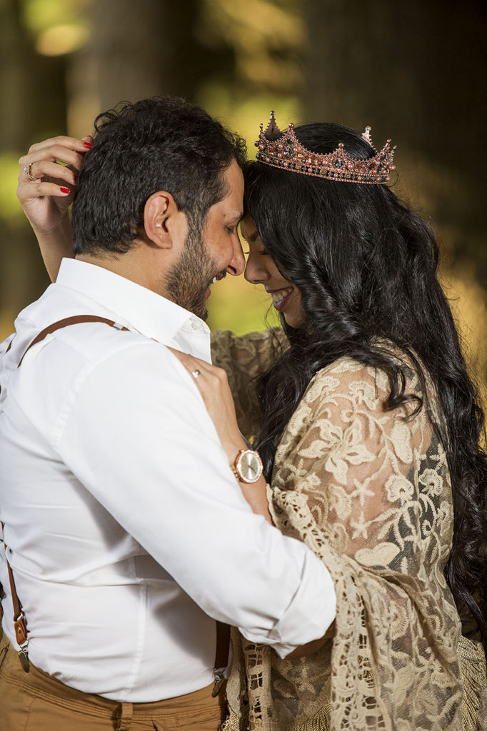 Boho wedding couple share an intimate moment together