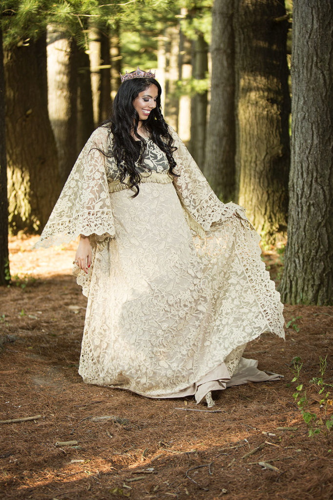 Ann Arbor Boho bride twirling in ivory lace wedding gown