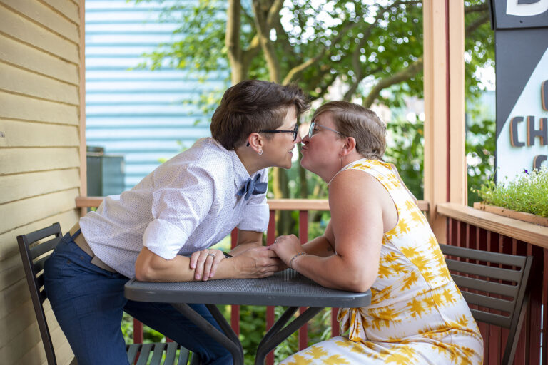 Same sex engagement photos at Zingerman's Deli in Ann Arbor