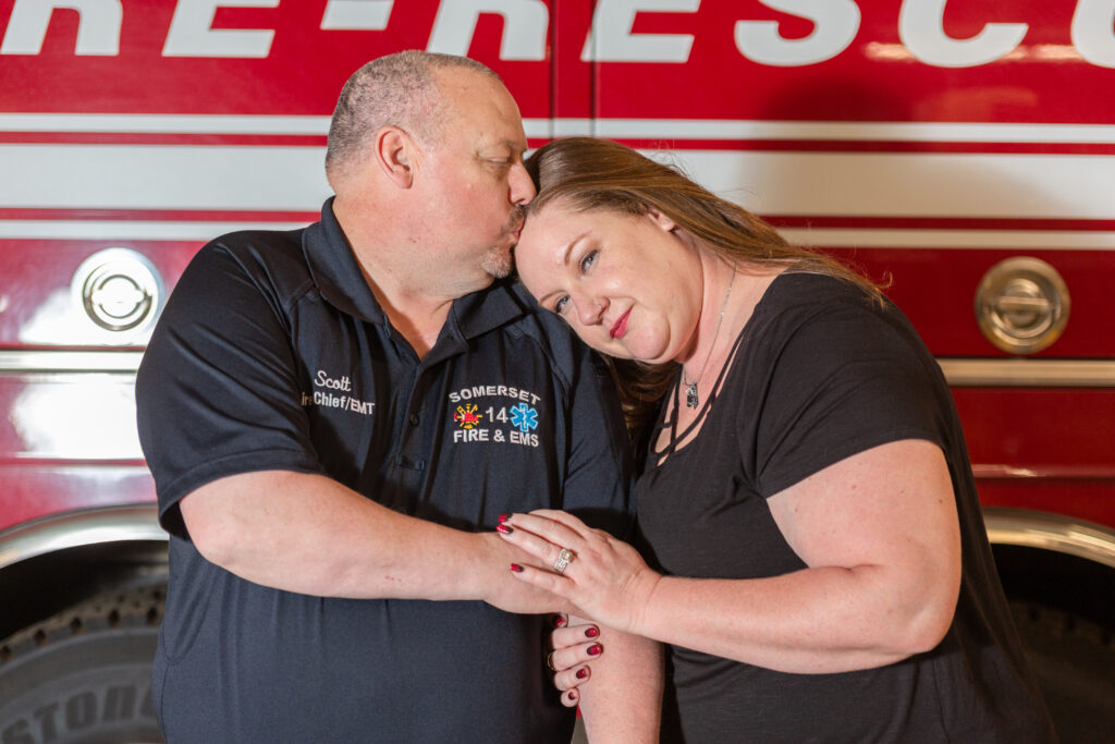 Michigan fire department engagement couple kissing