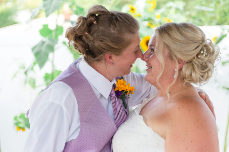 Michigan same sex wedding couple kissing Westland wedding