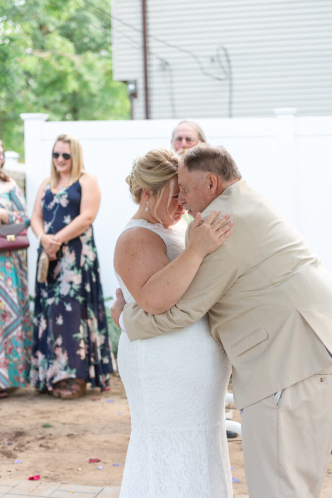 Father/daughter dance at backyard Westland wedding