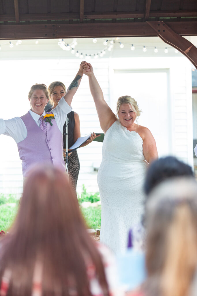 Newly announced wife and wife at their LGBT Westland wedding