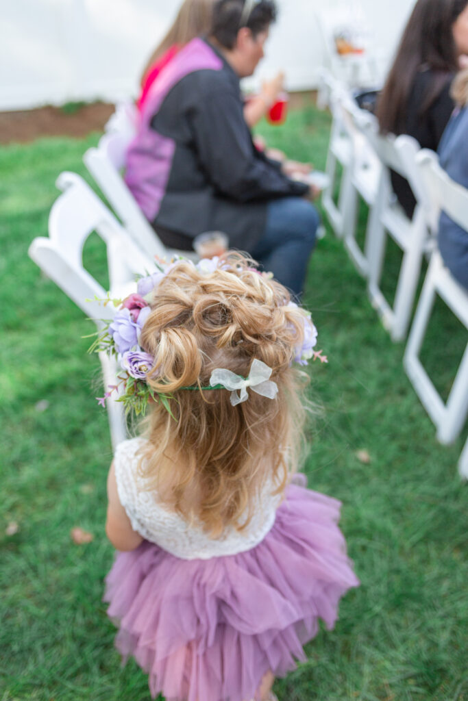 Purple floral crown on flower girl at Westland wedding