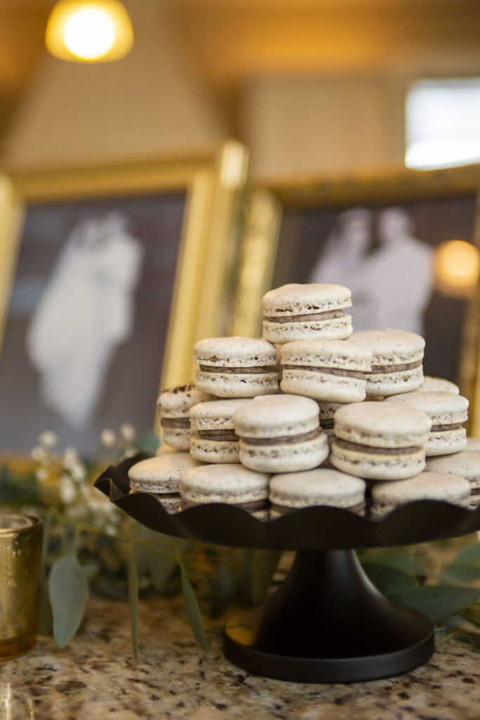 Cookies and cream macrons stacked up at Michigan AirBNB wedding