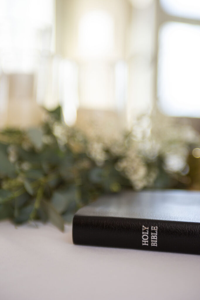 The Bible laying on the table before Michigan AirBNB wedding