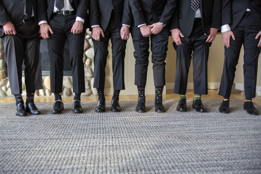 Groom and groomsmen's silly socks Michigan AirBNB wedding