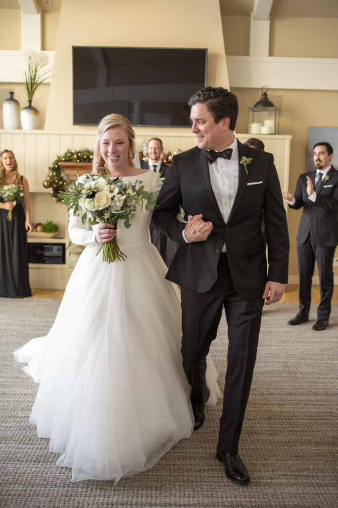 Exiting their ceremony as husband and wife AirBNB wedding