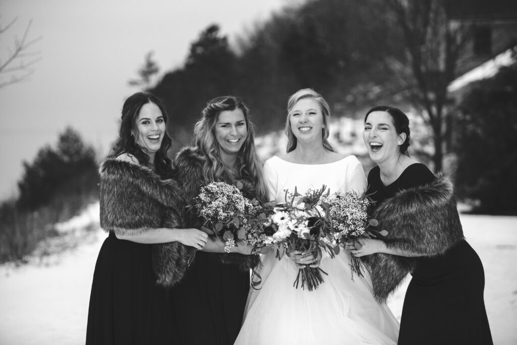 Bridesmaids laughing together at Lake Michigan luxury AirBNB wedding