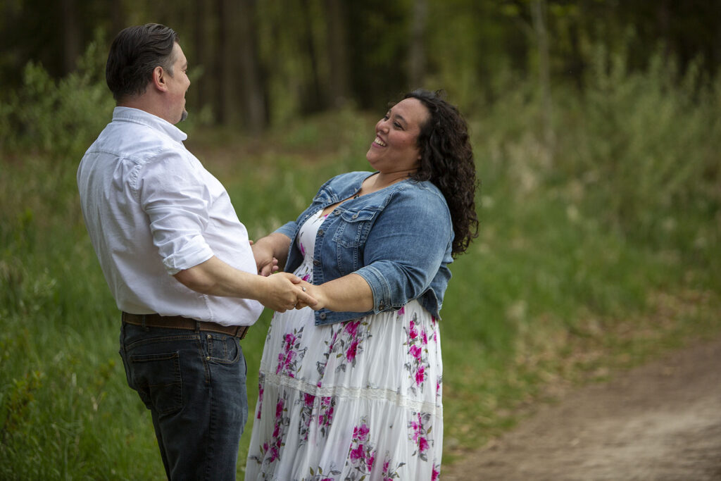 Kensington Metropark engagement couple holding hands