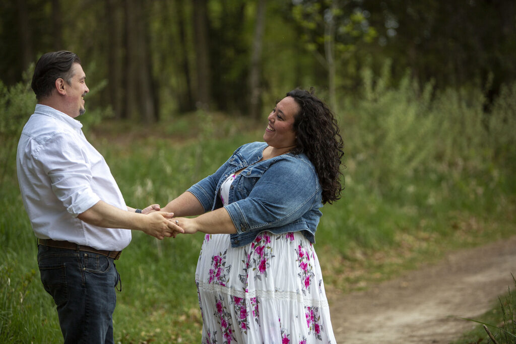 Kensington Metropark engagement session couple looks at each other