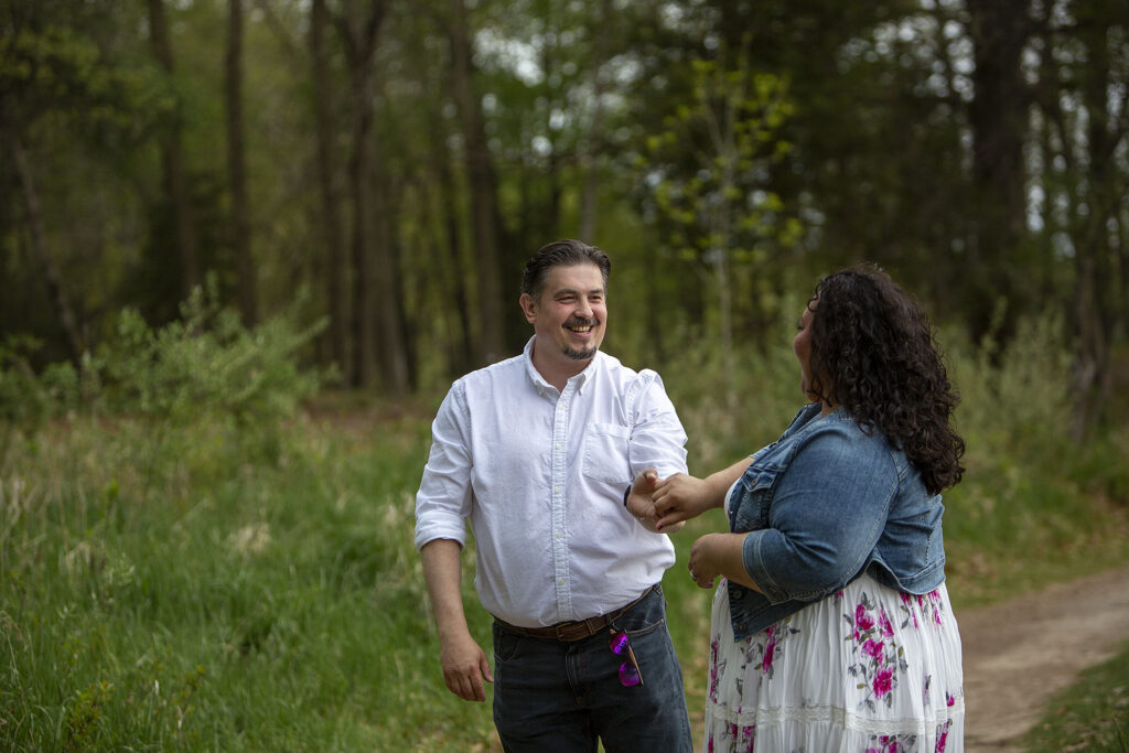 Mel twirling Sally during Kensington Metropark engagement session