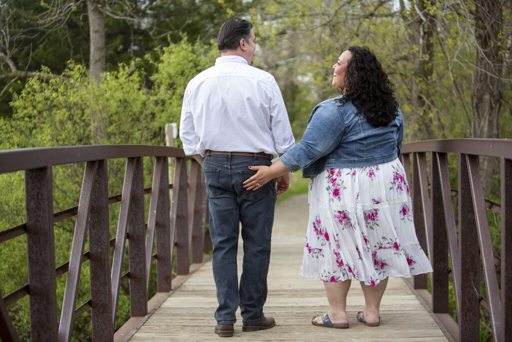 Sally smacking Mel's butt during Kensington Metropark engagement photos