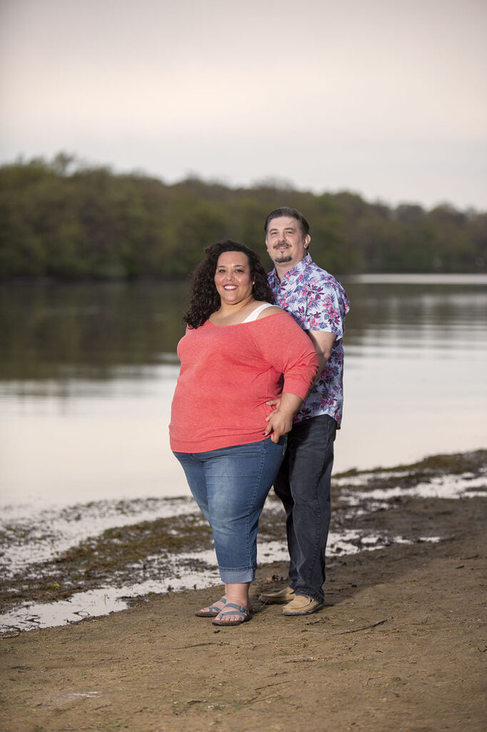 Couple standing with each other during golden hour at Kensington Metropark engagement session