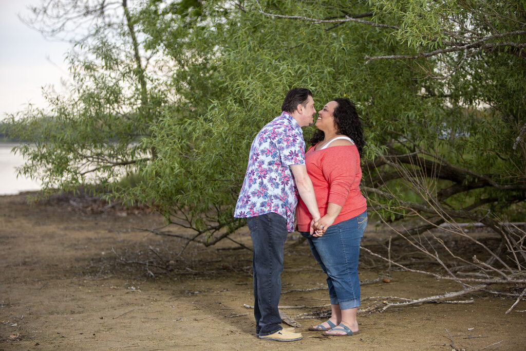 Michigan engaged couple kissing during Kensington Metropark engagement session