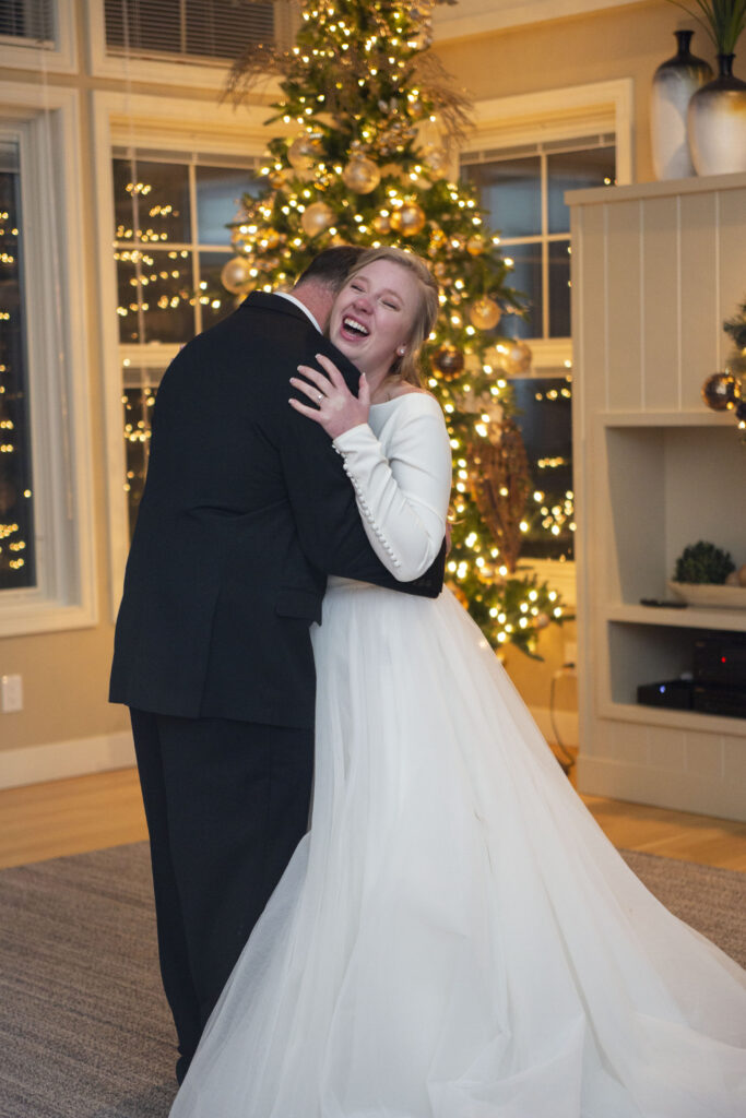 Father and daughter laughing during their dance together AirBNB wedding