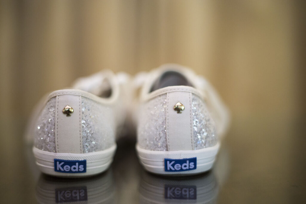 Kate Spade white glitter Keds at the Plymouth wedding