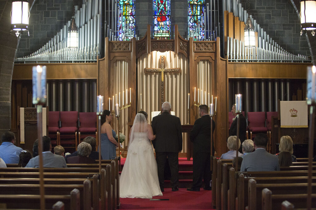 Plymouth wedding couple standing at the altar