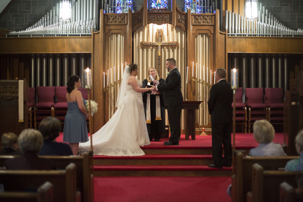 Plymouth wedding couple exchanging vows