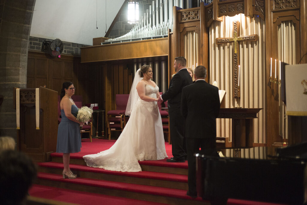 Michigan couple exchanging vows at their Plymouth wedding