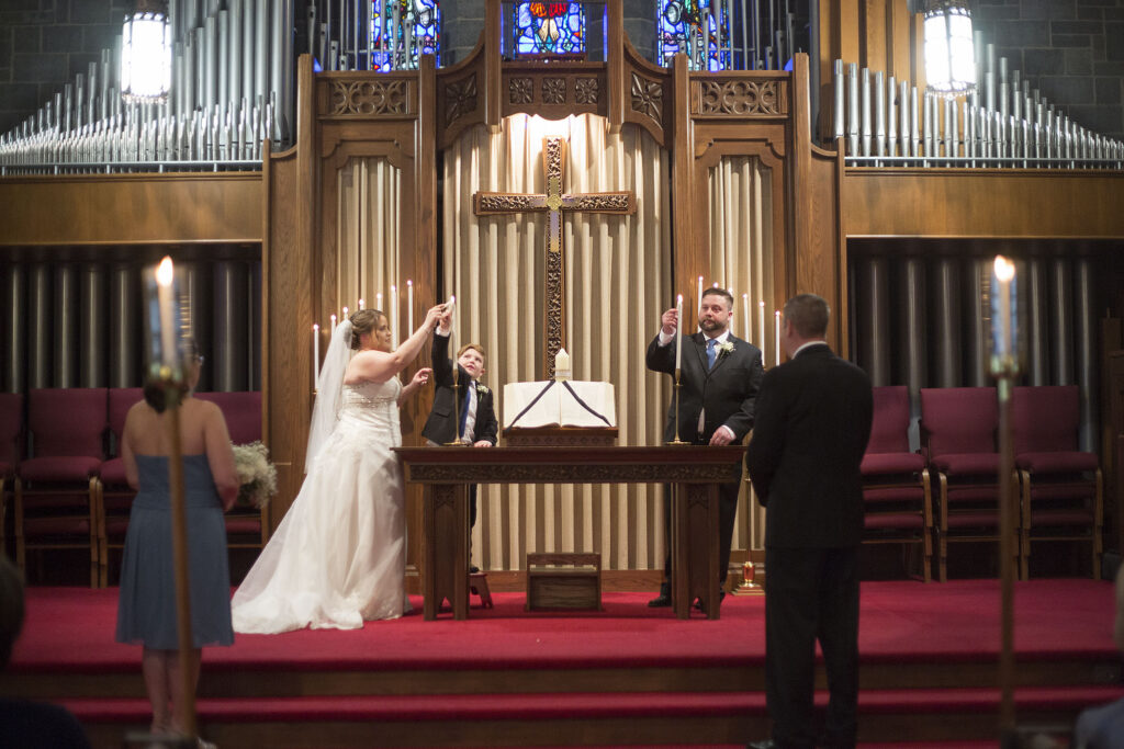 Lighting the pillar candles at Plymouth wedding