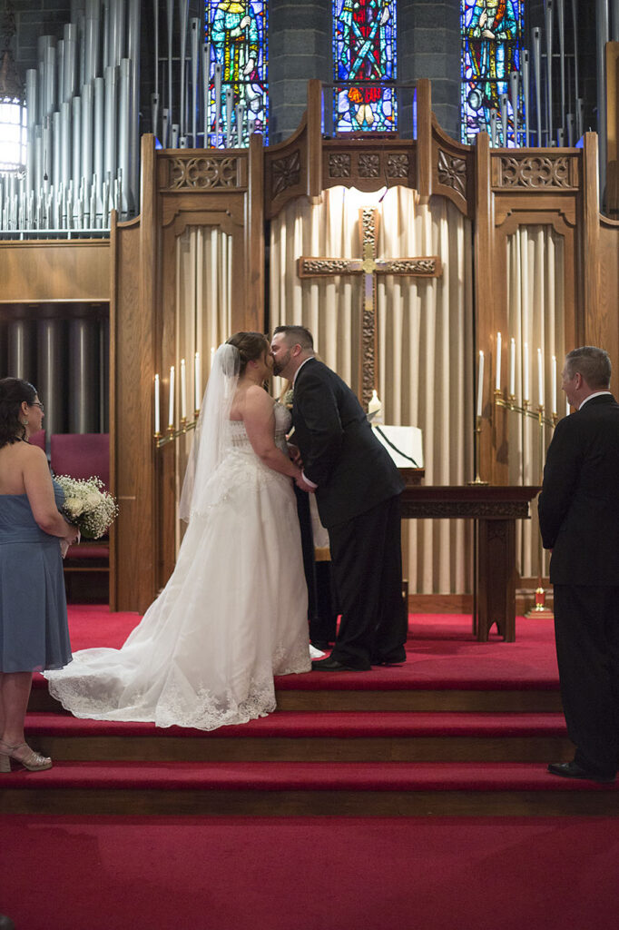 First kiss at Plymouth wedding