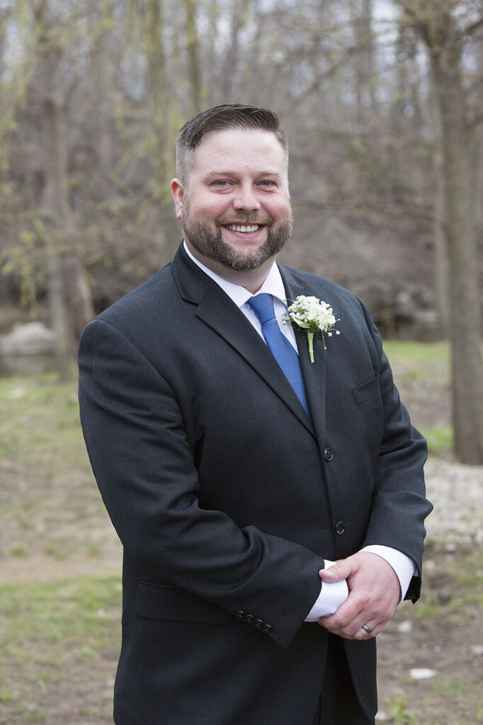 Groom at Parmenters Cider Mill after Plymouth wedding