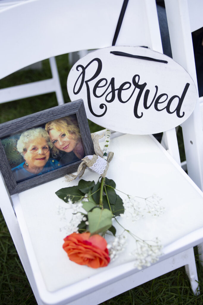 A seat reserved for the bride's grandmother that had passed away at their Westland wedding