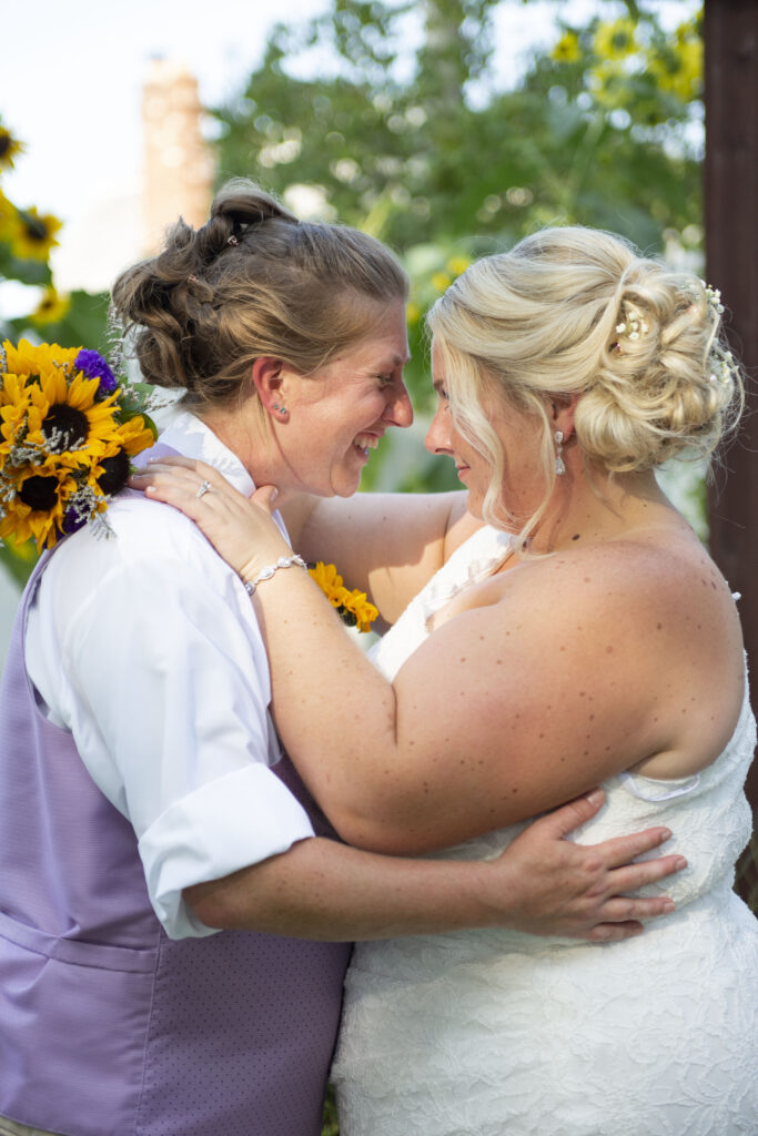 Amanda and Jennifer getting ready to kiss Westland wedding