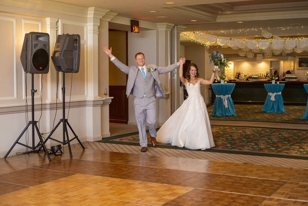 Bride and groom enter their Jackson Michigan wedding reception