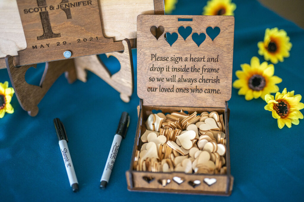 Wooden heart guest board at Addison wedding