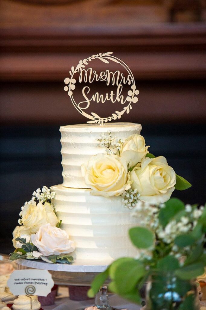 Enchanted Oven's wedding cake decorated with pale yellow roses.