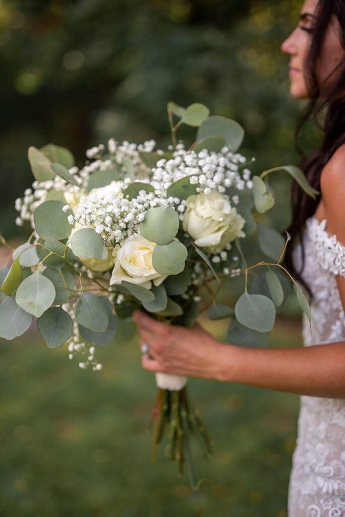 Roses, eucalyptus, and baby's breath wedding bouquet at Saline Michigan wedding.