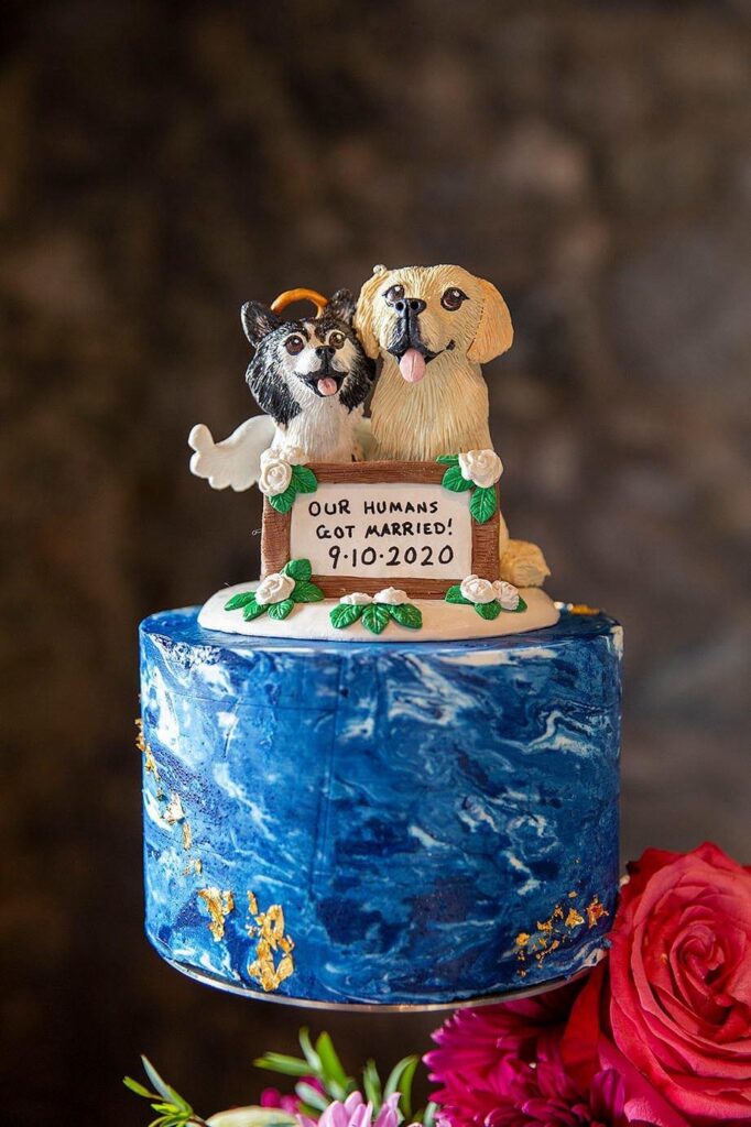 Custom dog cake topper at up north Michigan wedding.