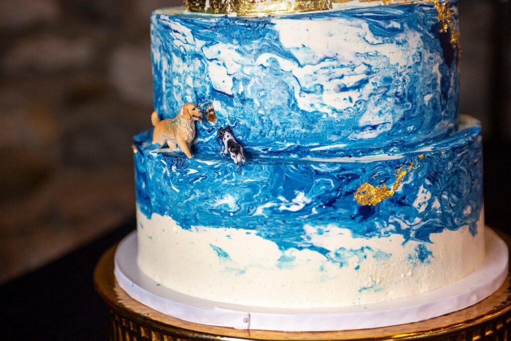 Adorable hidden dog detail on Charlevoix Michigan wedding cake.