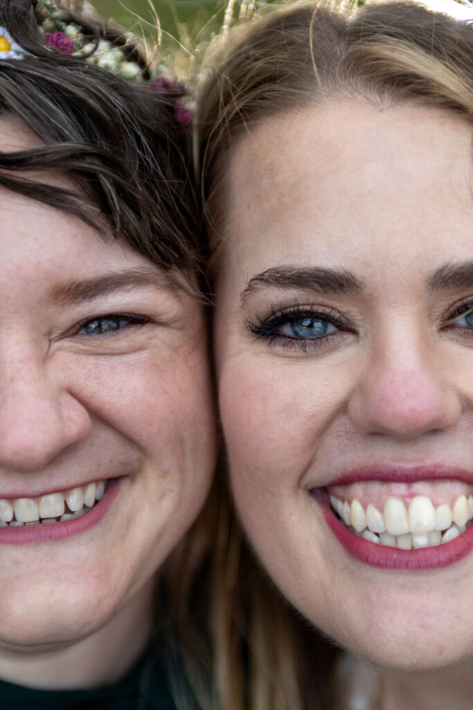 Jillian and Nikki with their faces touching after their Marquette wedding in the Upper Peninsula of Michigan.