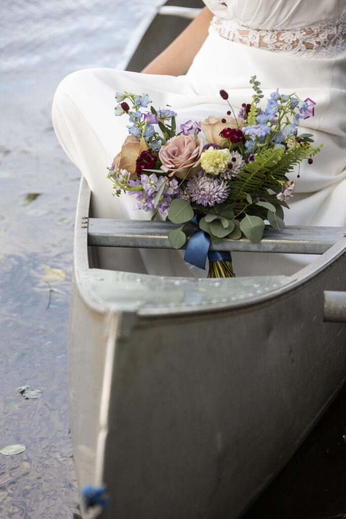 Bride robe draped over a chair at Pinecrest Northwoods