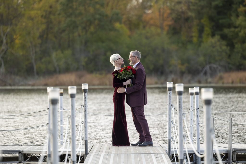 Couple dances on the dock at Camp Woodbury.