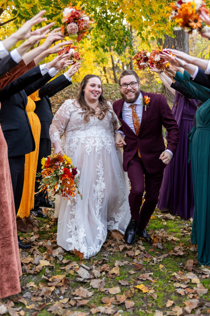 Ypsilanti Wedding Photography takes photos of couple at Frog Island during the fall.