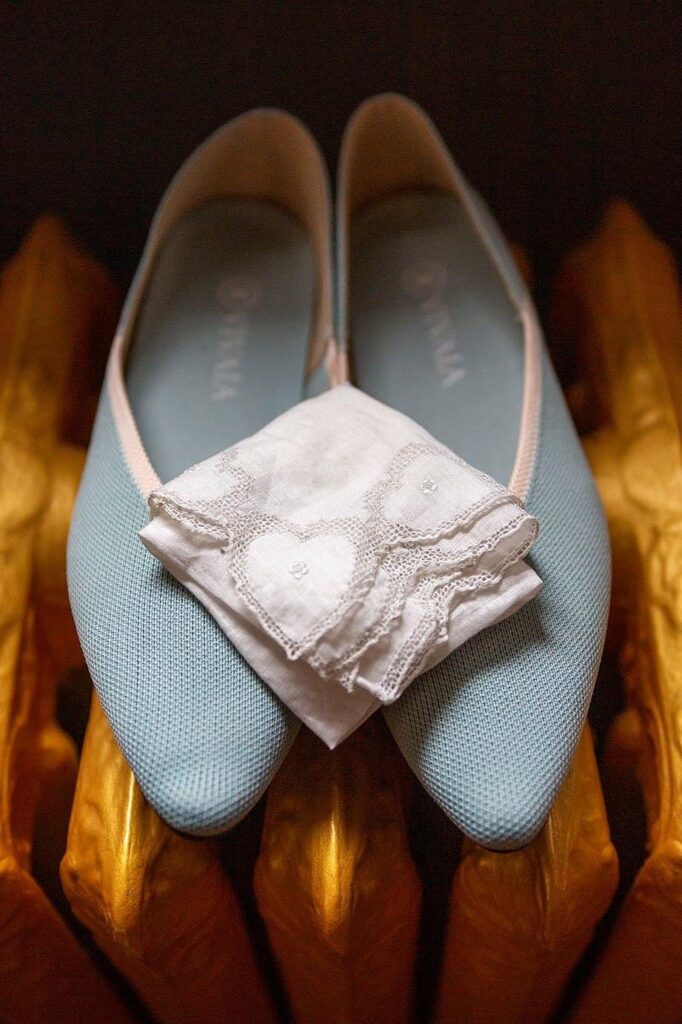 Close up image of something blue wedding shoes with an embroidered hanky Lansing micro wedding