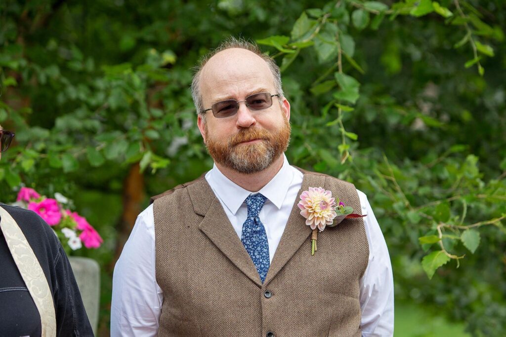 Groom in the gardens at Turner Dodge House