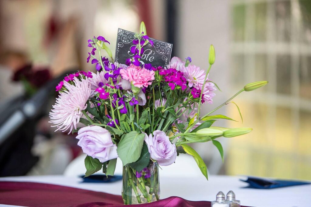 Beautiful wedding florals in pinks and purples