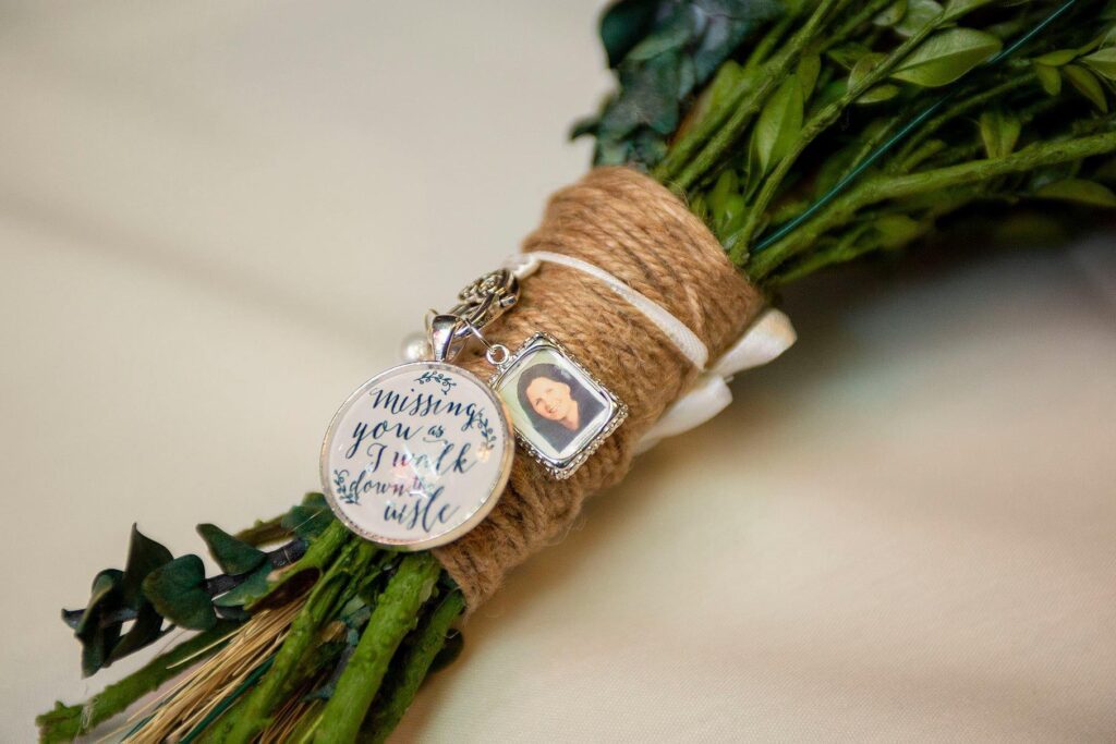 Brides memorial charms on their wedding bouquet