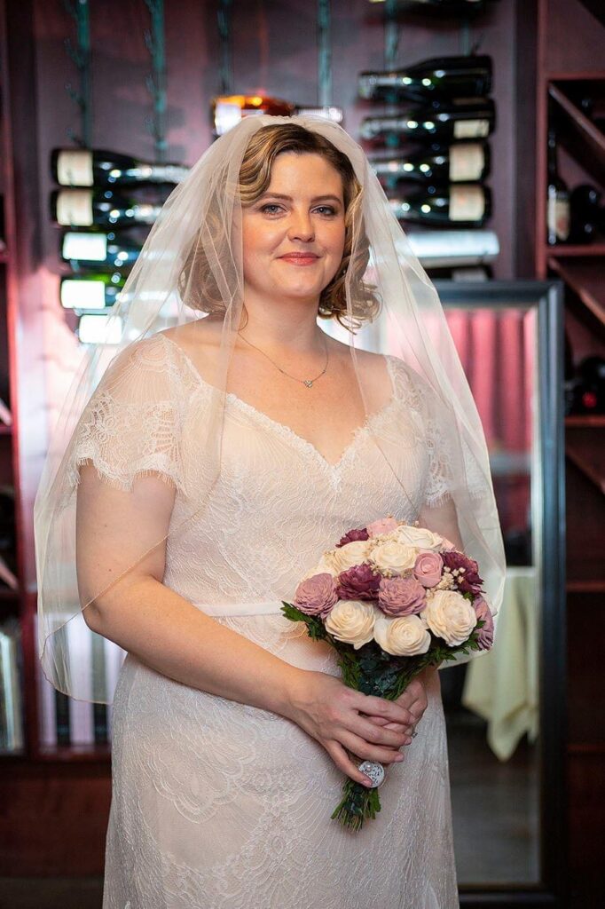 Bride poses for formal image at Vinology wedding in Ann Arbor