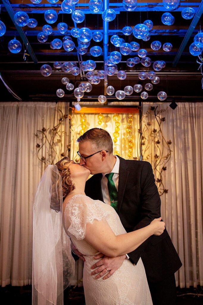 Vinology wedding photographer takes photos in front of the infamous bubble ceiling