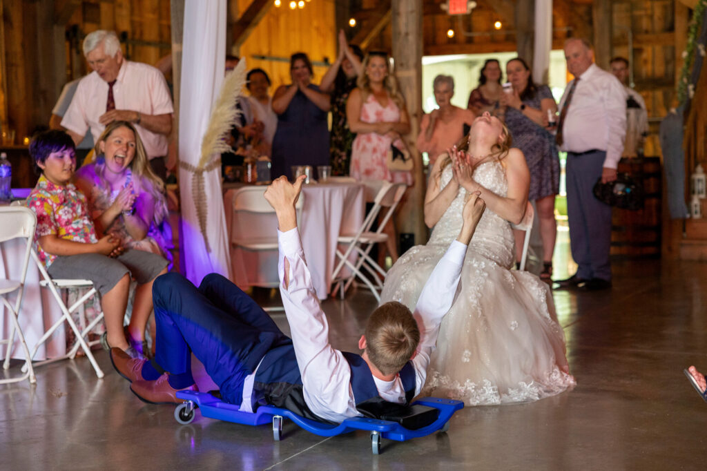 Groom slides out on creeper after getting the garter